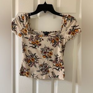 Woman’s floral shirt